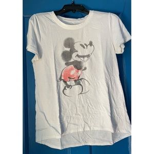 White shirt with a Mickey Mouse design on it!